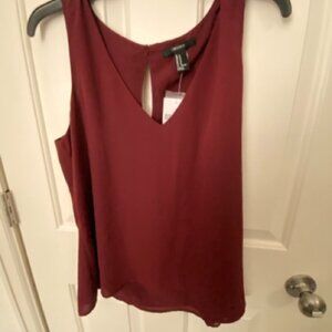 Women's maroon sleeveless blouse top